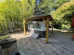 HOT TUB at a cozy private suite with a large patio - Image 5