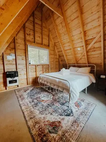 Rustic off-grid A-frame cabin - Image 4