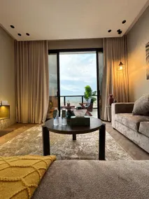Sea View 1BR with Rooftop & Game Table 22A - Image 2