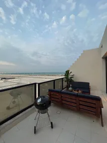 Sea View 1BR with Rooftop & Game Table 22A - Image 4