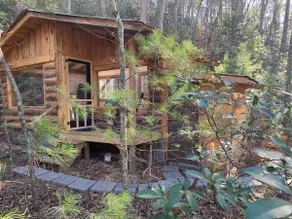 *The Moon and You* Creekside Off Grid Glass Cabin - Image 5