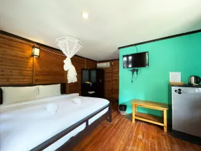 A Cozy Wooden Cabin at Klong Dao Beach - Image 2