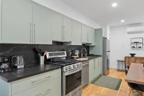 Chic 2BR Top-Floor Retreat w/Rooftop Near Subway - Image 3