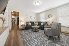 Elegant 2BR w/ Custom Wood Charm - Image 2