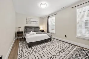 Elegant 2BR w/ Custom Wood Charm - Image 4