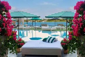 Elegant Corner 1BR Apartment with Balcony + Pool - Image 2