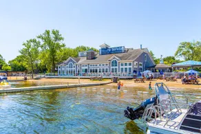 Modern 4BR Lake Retreat • Walk to Beach & Main St - Image 4