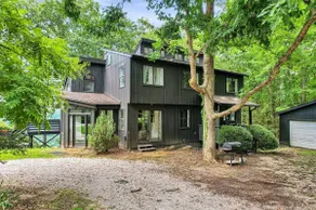 Cliffside Cabin Escape in the Woods - Image 3