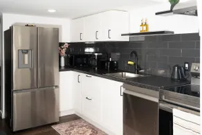 Modern 1BR Suite with Free Onsite Parking - Image 4