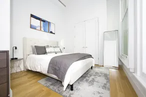 Gorgeous Tribeca 2BR w/ Amazing city views + Gym by Blueground - Image 3