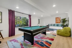 Spacious 4BD - Central Stay with Backyard & Games - Image 4