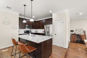 Walkable Heights 3BR Townhome + Putting Green - Image 3
