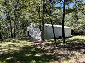 Shouse in the woods near the lake - Image 2