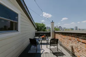 Stunning 4BR Townhome Rooftop City Views - Image 5