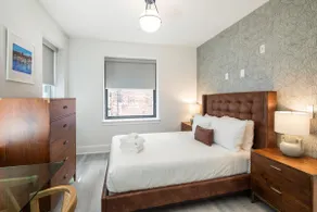Sosuite | Corner 1BR Apt w Laundry, Workspace - Image 3