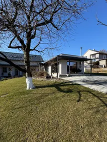 A designer cottage with a terrace and a fireplace - Image 2