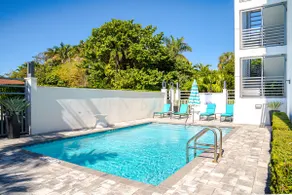 Steps to Beach • Modern 2BR w/ Balcony & Pool - Image 4