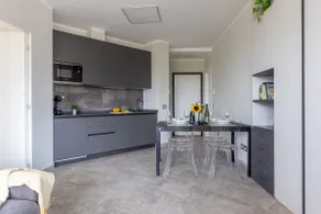 GuestHost - Elegant Seaside Apt - Pool and Parking - Image 3