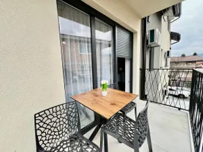 Deluxe One-Bedroom Apartment with Private Parking - Image 2