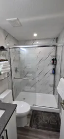 Bleniel Place - Stylish Basement Suite with Wi-Fi Netflix & Parking - Image 5
