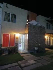 House in a residential development with a pool - Image 2