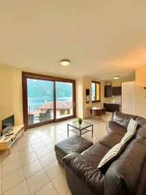 Schöne Wohnung mit Swimmingpool und atemberaubendem Seeblick - Image 3