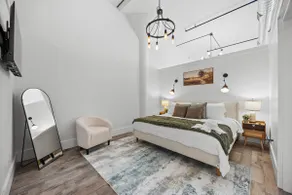 20 Mins to NYC | Chic 2BR Loft w/ Gym & BBQ - Image 3