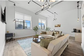 20 Mins to NYC | Chic 2BR Loft w/ Gym & BBQ - Image 2