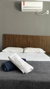 Suites 1 km from Tucuns Beach, Room with a double bed. - Image 5