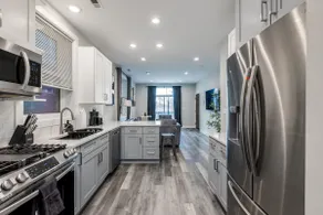 Renovated 3BR Apt w/ In-unit Laundry & Parking - Image 3