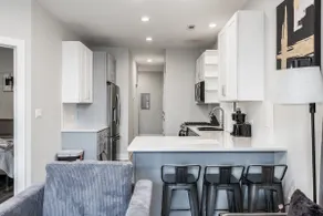 Renovated 3BR Apt w/ In-unit Laundry & Parking - Image 5