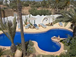 Aladdin cottage in a lush patio with pool - Image 2