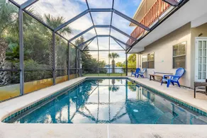 SAND CASTLE: Big beach house. Walk to Beach. Heated Pool in screened pool house. - Image 4