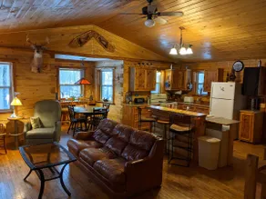 Secluded log cabin with acreage + all the comforts - Image 3