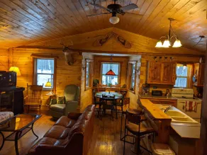 Secluded log cabin with acreage + all the comforts - Image 4