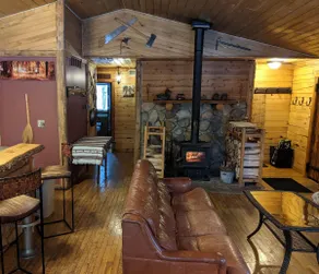 Secluded log cabin with acreage + all the comforts - Image 5