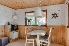 Cozy guesthouse with a canoe and sea view - Image 5