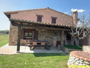 A four-bedroom country house with a porch and swimming pool - Image 5