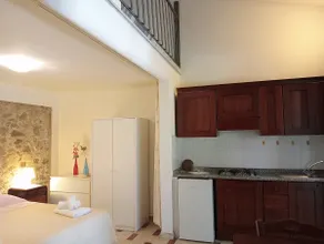 Loft with a view of the patio and pool - Image 4
