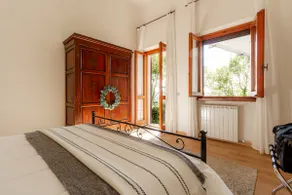 Spacious Apartment with Garden & Air Conditioning - Image 3