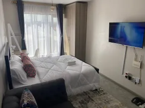 Amazing Cosy Studio Near Airport with Rooftop View - Image 2