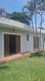 Gated community house with pool and court - Image 3
