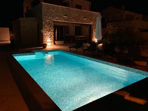 Stone house villa with an electric vehicle charging station - Image 4