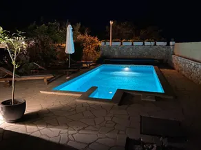 Stone house villa with an electric vehicle charging station - Image 5