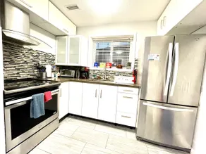 3BR Private & Convenient Garden Level Suite - Image 5
