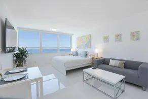 New Oceanfront condo 180º view steps to the beach - Image 2