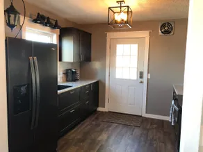 Upscale Main Street Apartment With City Views - Image 2