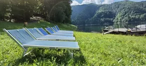 Lake cabin with floating pontoon, outdoor hot tub. - Image 3
