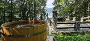 Lake cabin with floating pontoon, outdoor hot tub. - Image 5