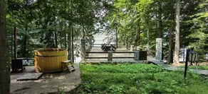 Lake cabin with floating pontoon, outdoor hot tub. - Image 2